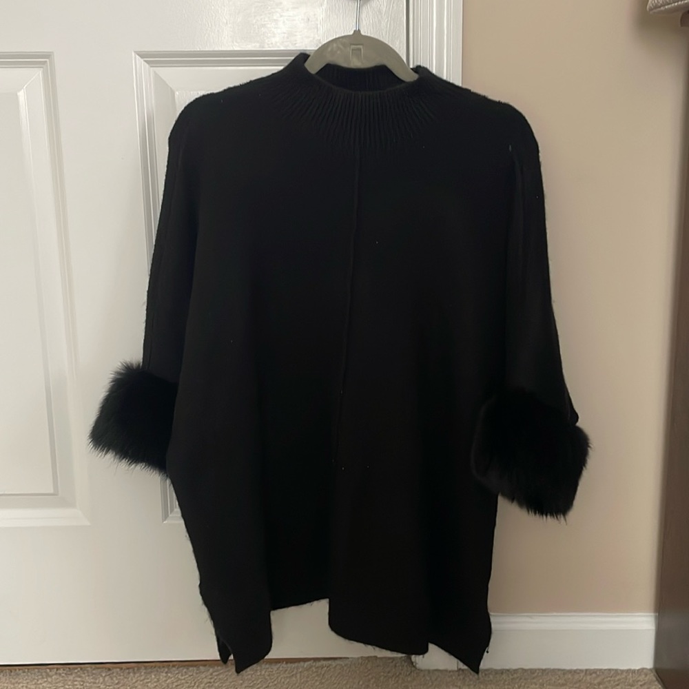 Poncho with faux fur
